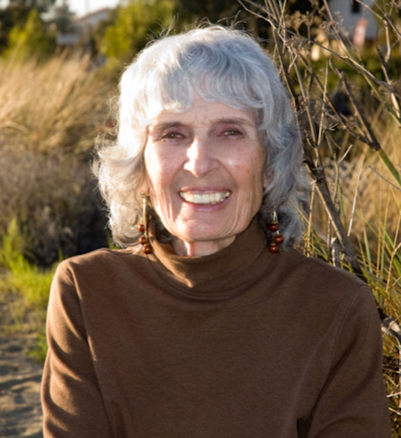 Woman outdoors smiling