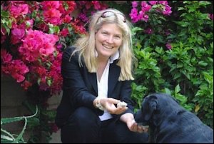 Woman with black dog